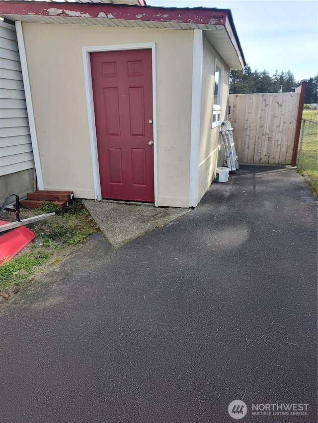 192 Canal Dr NE, Ocean Shores, WA 98569 - doorway to property featuring fence