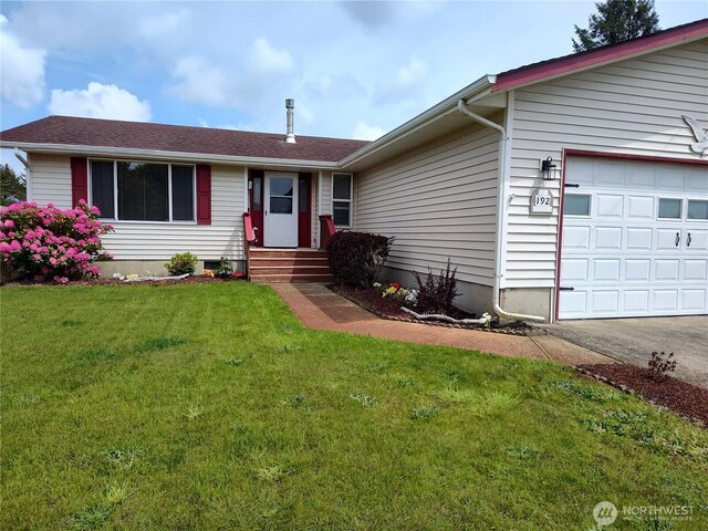 192 Canal Dr NE, Ocean Shores, WA 98569 - ranch-style house with a garage and a front yard