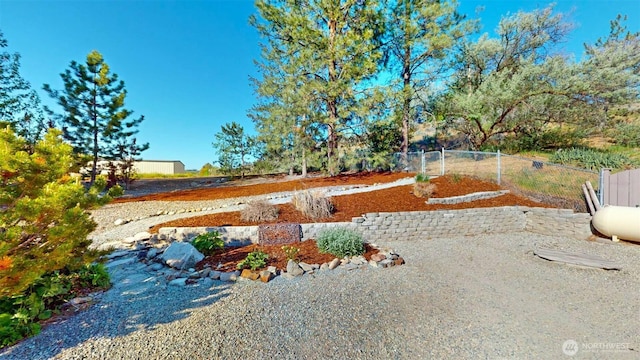 view of yard featuring fence