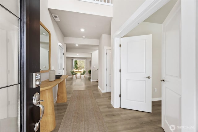 16226 SE 133rd Pl Unit 104, Renton, WA 98059 - entrance foyer with wood finished floors, baseboards, and recessed lighting