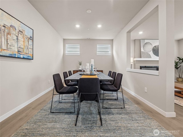 16226 SE 133rd Pl Unit 104, Renton, WA 98059 - dining space featuring wood finished floors, recessed lighting, and baseboards