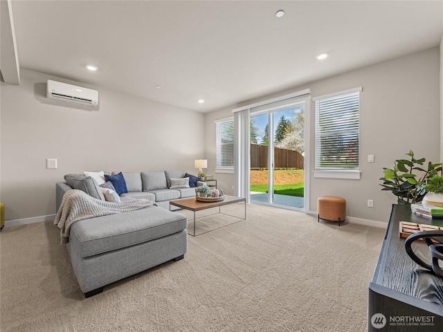 16226 SE 133rd Pl Unit 104, Renton, WA 98059 - carpeted living room with baseboards, a wall mounted air conditioner, and recessed lighting