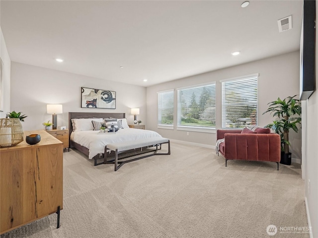 16226 SE 133rd Pl Unit 104, Renton, WA 98059 - bedroom featuring light carpet, baseboards, and recessed lighting