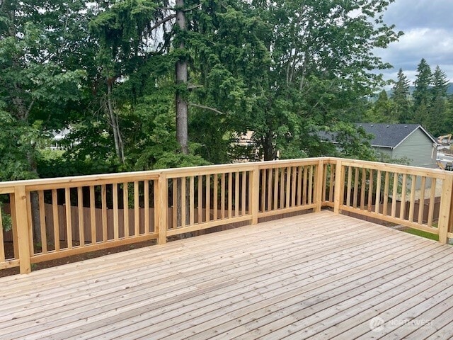 16226 SE 133rd Pl Unit 104, Renton, WA 98059 - deck with view of wooded area