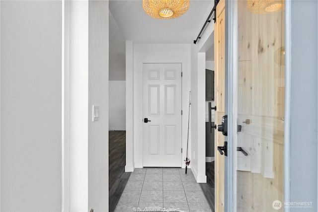 117 Water St, Chelan, WA 98816 - corridor featuring a barn door and baseboards