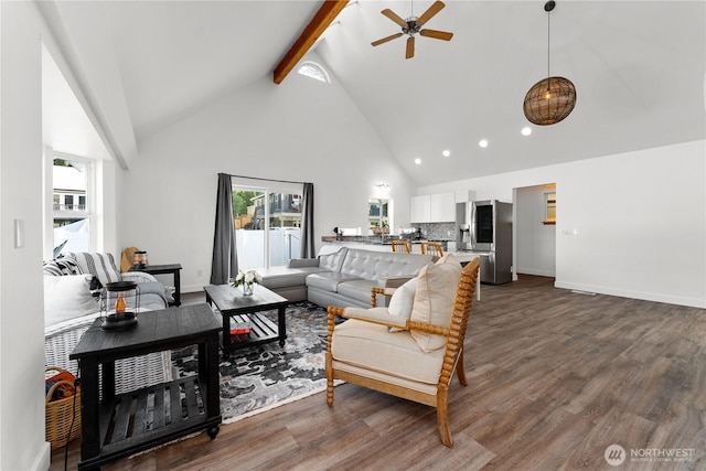 117 Water St, Chelan, WA 98816 - living room featuring high vaulted ceiling, beamed ceiling, dark wood-style floors, and plenty of natural light