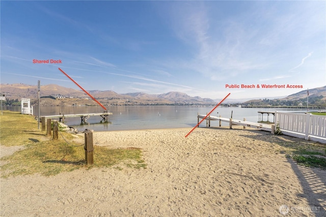 117 Water St, Chelan, WA 98816 - view of water feature featuring a mountain view and a boat dock