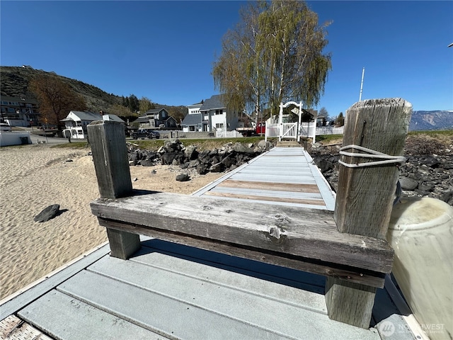 117 Water St, Chelan, WA 98816 - dock area featuring a mountain view and a residential view