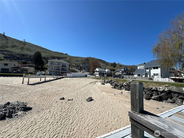 117 Water St, Chelan, WA 98816 - view of yard featuring a mountain view and a residential view