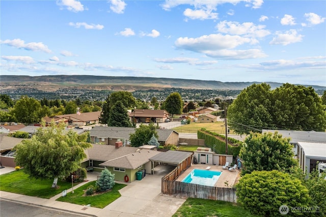 1315 Poe St, Wenatchee, WA 98801 - aerial view of residential area featuring a mountainous background and a pool area