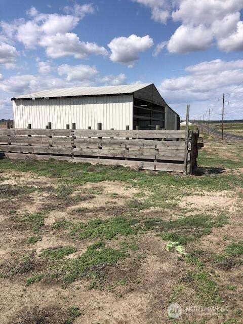 view of outdoor structure featuring an exterior structure and an outbuilding