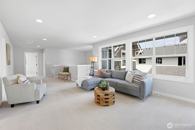 living room with baseboards, carpet flooring, visible vents, and recessed lighting