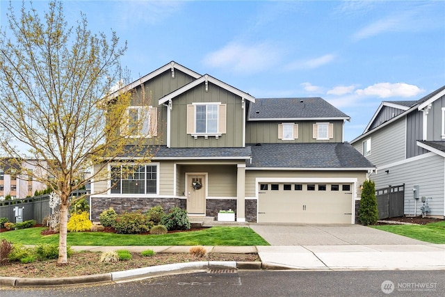 22819 SE Fir St, Black Diamond, WA 98010 - craftsman-style house featuring a garage, stone siding, and fence