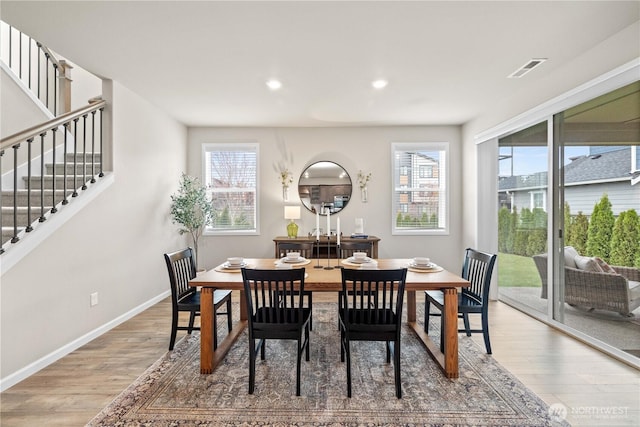 22819 SE Fir St, Black Diamond, WA 98010 - dining area featuring recessed lighting, plenty of natural light, and wood finished floors
