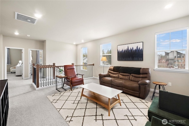 22819 SE Fir St, Black Diamond, WA 98010 - living area with visible vents, baseboards, recessed lighting, and light carpet