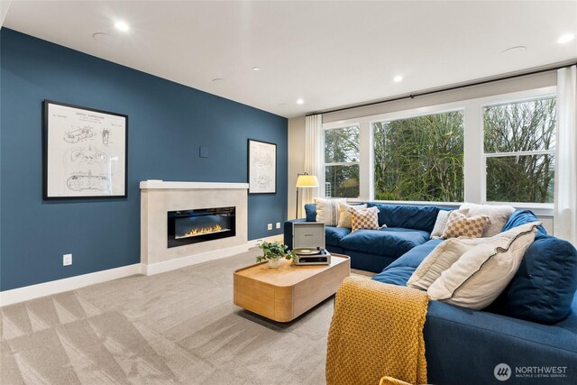 16306 SE 133rd Pl Unit 105, Renton, WA 98059 - living room with a glass covered fireplace, carpet floors, and recessed lighting