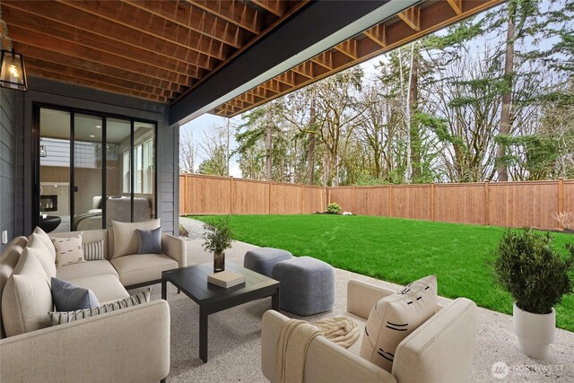 16306 SE 133rd Pl Unit 105, Renton, WA 98059 - fenced backyard featuring a patio area and an outdoor living space