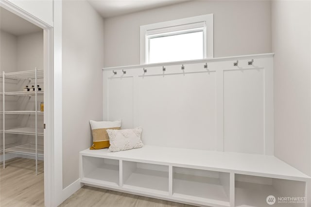 16306 SE 133rd Pl Unit 105, Renton, WA 98059 - mudroom featuring light wood-style flooring and baseboards
