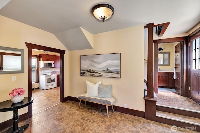 250 SE Andrews St, Issaquah, WA 98027 - corridor with light tile patterned floors, stairs, and baseboards