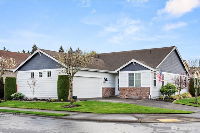 view of front facade featuring a garage, a front yard, driveway, and stone siding