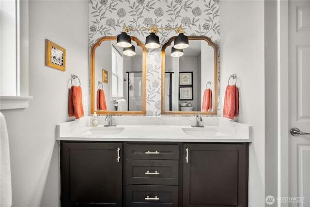 full bath featuring a sink and double vanity