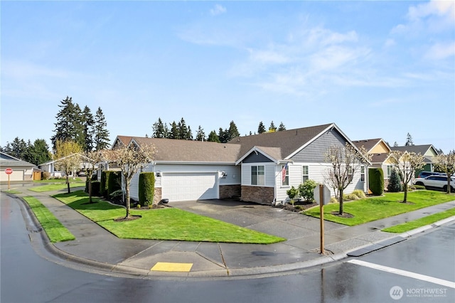 single story home with driveway, a front yard, a residential view, and a garage