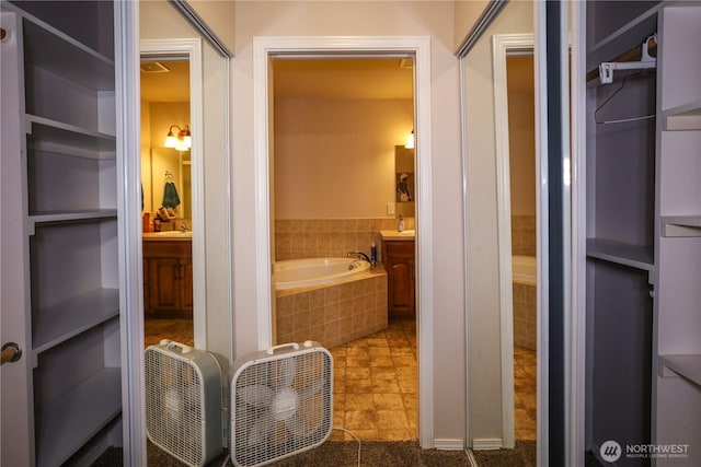 204 Brant Ln, Hoquiam, WA 98550 - bathroom with vanity and a garden tub