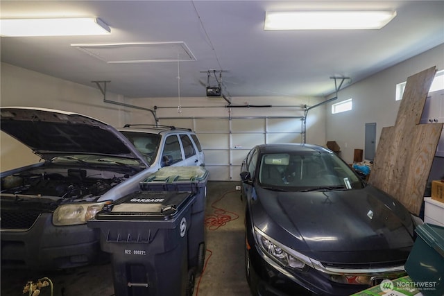 204 Brant Ln, Hoquiam, WA 98550 - garage with electric panel and a garage door opener
