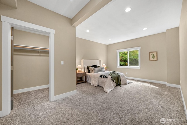 bedroom with baseboards, recessed lighting, and carpet