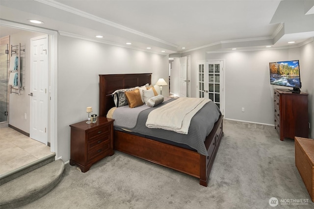 bedroom featuring ornamental molding, french doors, recessed lighting, and light colored carpet