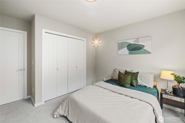 24014 Lily Pl SE, Black Diamond, WA 98010 - carpeted bedroom with a closet and baseboards