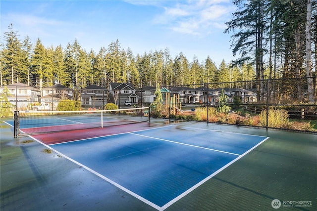 24014 Lily Pl SE, Black Diamond, WA 98010 - view of tennis court with fence and a residential view
