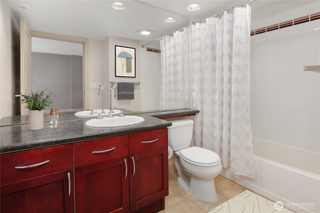 full bath featuring toilet, shower / bathtub combination with curtain, tile patterned flooring, and vanity