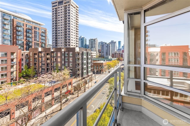 balcony featuring a city view