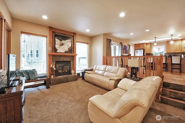 41 Rocky Ridge Dr, Bellingham, WA 98229 - living area featuring carpet flooring, a wealth of natural light, a fireplace, and recessed lighting