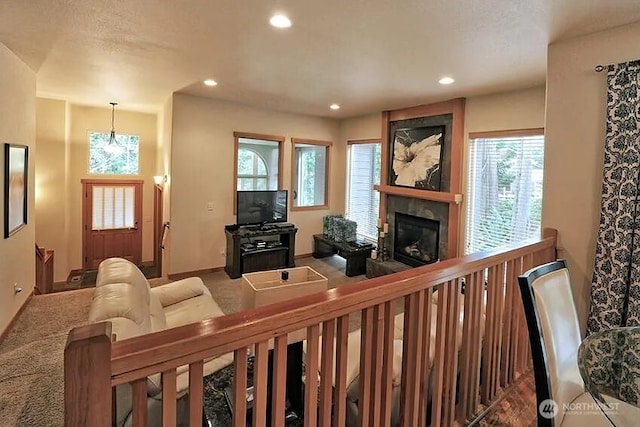 41 Rocky Ridge Dr, Bellingham, WA 98229 - living room with carpet flooring, a large fireplace, recessed lighting, and a notable chandelier