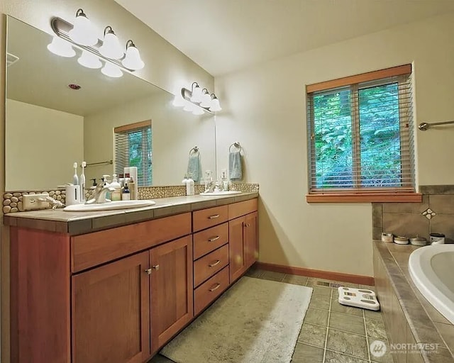 41 Rocky Ridge Dr, Bellingham, WA 98229 - bathroom featuring a sink, a garden tub, and a wealth of natural light