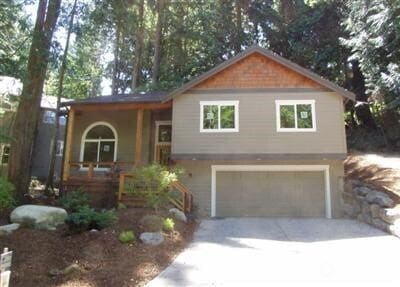 41 Rocky Ridge Dr, Bellingham, WA 98229 - view of front of home featuring driveway, an attached garage, and a porch