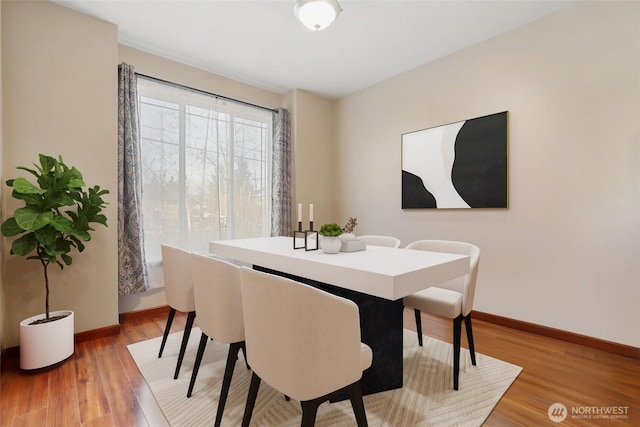 9423 18th Ave W Unit A, Everett, WA 98204 - dining area with light wood-type flooring and baseboards