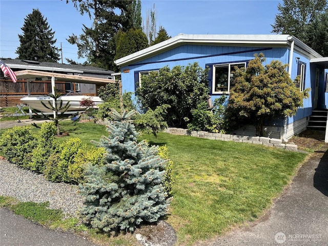 8505 143rd Avenue Ct E Unit 38, Puyallup, WA 98372 - view of front facade featuring a front lawn