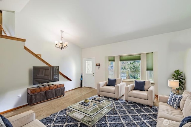 living room with a chandelier, baseboards, and stairs