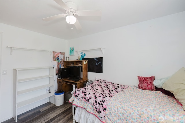 bedroom with a ceiling fan and wood finished floors