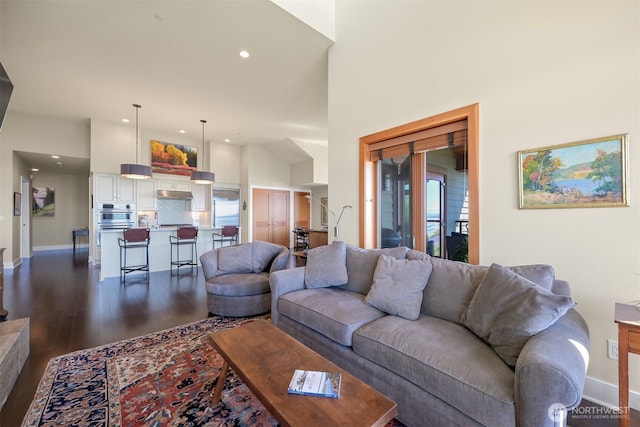 9535 Semiahmoo Pkwy Unit B305, Blaine, WA 98230 - living area with a high ceiling, dark wood-style floors, baseboards, and recessed lighting