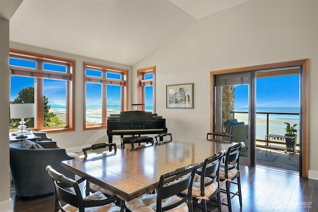 9535 Semiahmoo Pkwy Unit B305, Blaine, WA 98230 - dining room featuring dark wood-style flooring, a water view, and vaulted ceiling