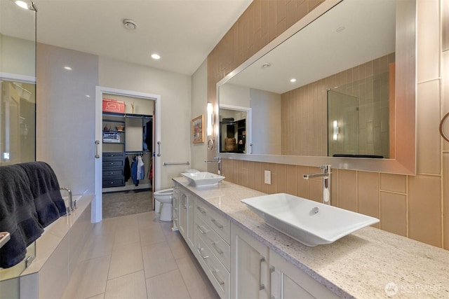 9535 Semiahmoo Pkwy Unit B305, Blaine, WA 98230 - full bathroom with a shower with door, double vanity, a sink, and tile patterned floors