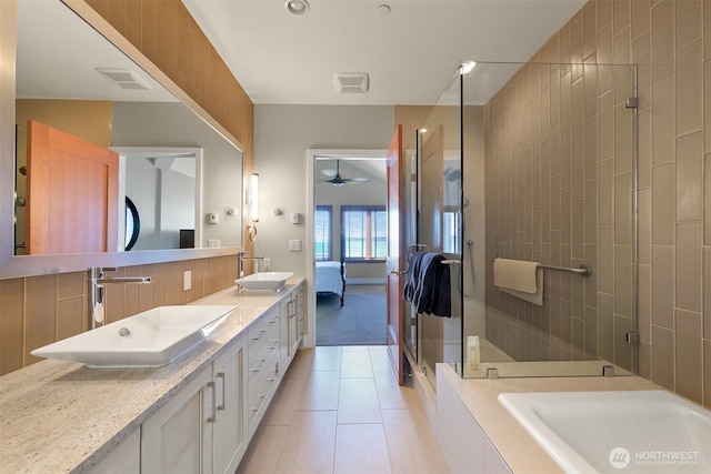 9535 Semiahmoo Pkwy Unit B305, Blaine, WA 98230 - full bathroom featuring visible vents, connected bathroom, a sink, and a shower stall