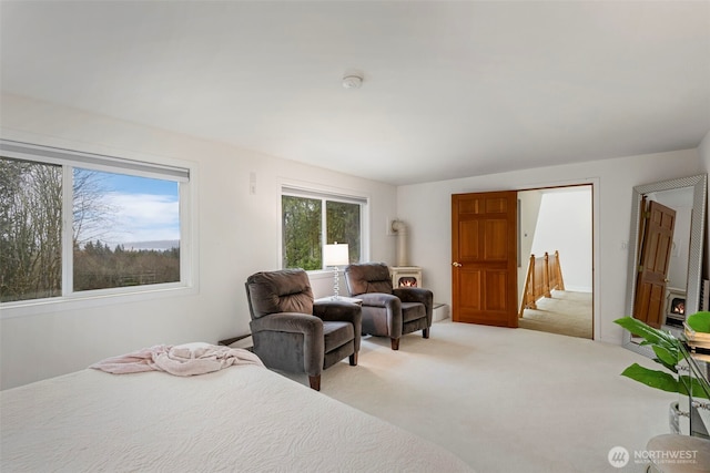 bedroom with light colored carpet