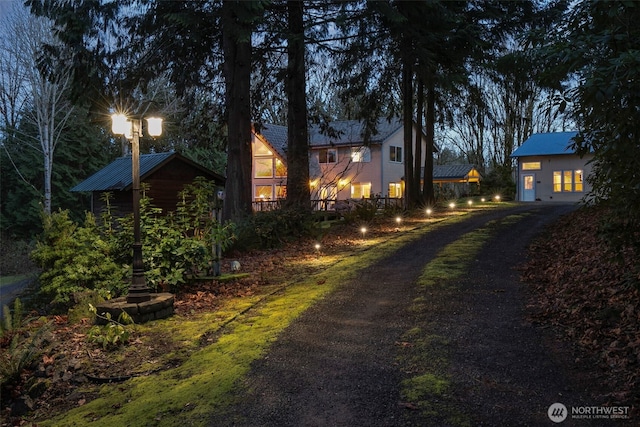 view of home's exterior with driveway