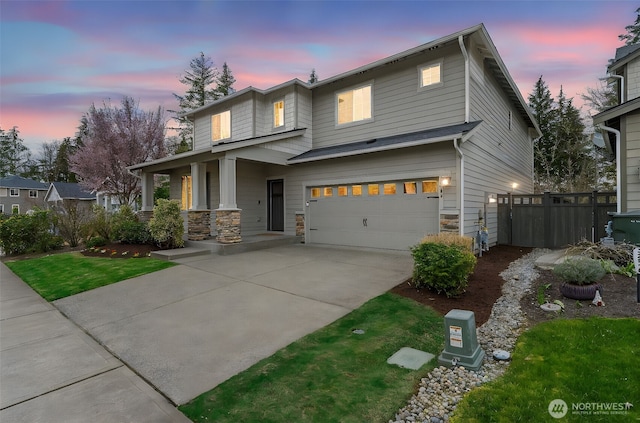 32904 SE Stevens St, Black Diamond, WA 98010 - view of front of property featuring stone siding, driveway, a garage, and fence