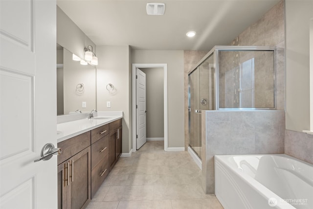 32904 SE Stevens St, Black Diamond, WA 98010 - full bathroom with double vanity, tile patterned floors, a sink, a stall shower, and a garden tub